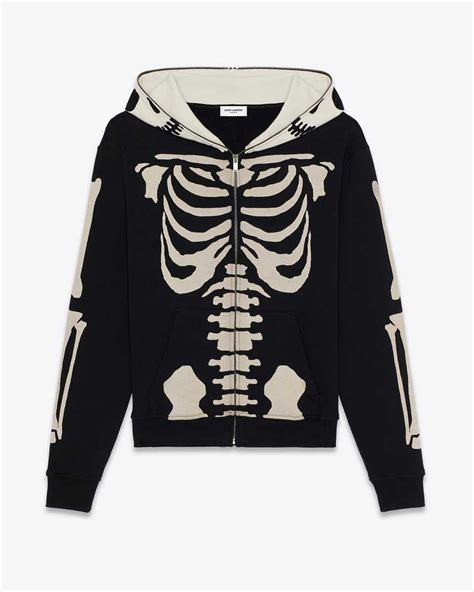 yves saint laurent skeleton sweater|hoodie and Saint Laurent boots.